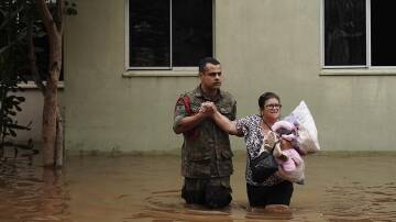 The death toll could rise from heavy rainfall and flooding in southern Brazil, authorities warn. (AP PHOTO)
